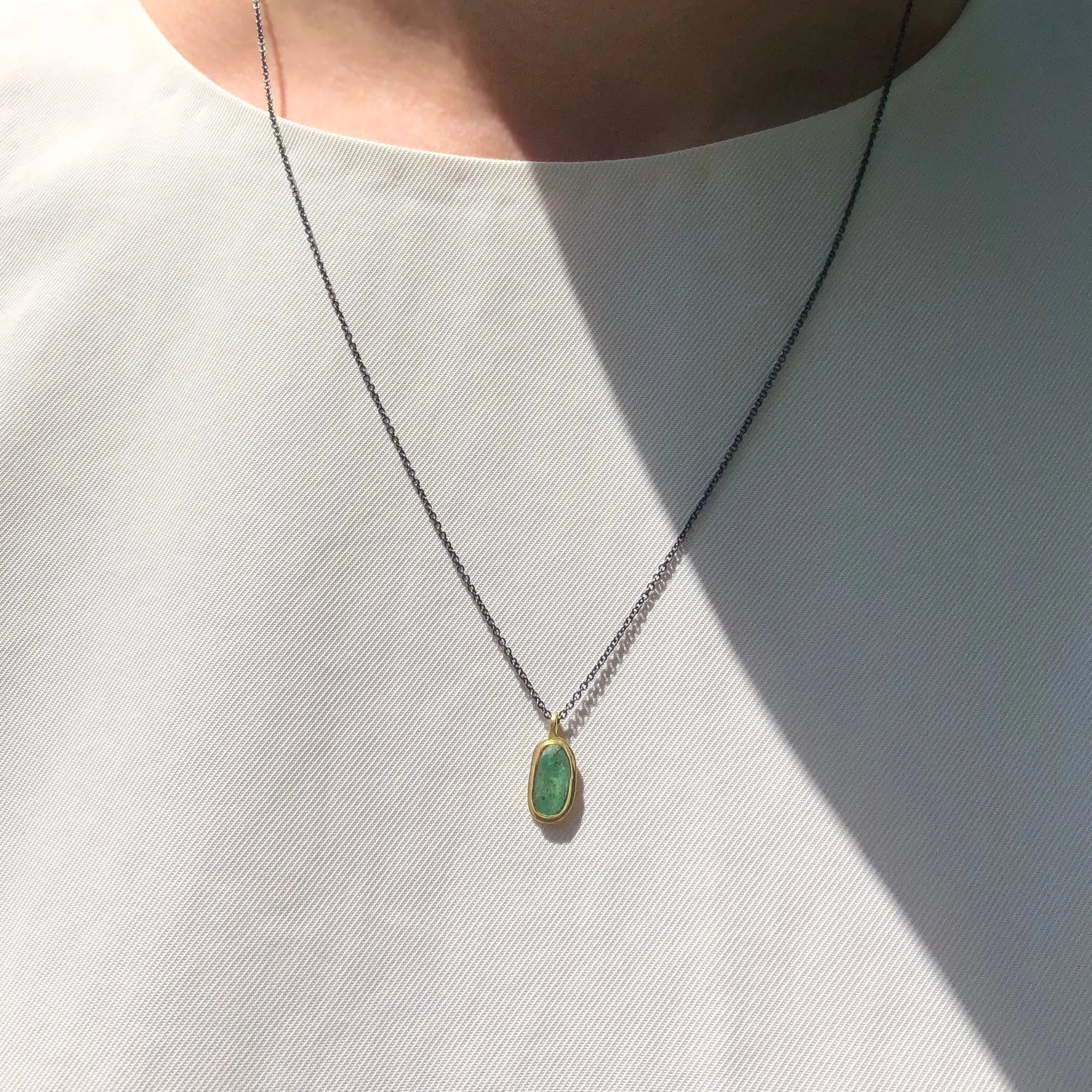 Emerald & 18k pendant