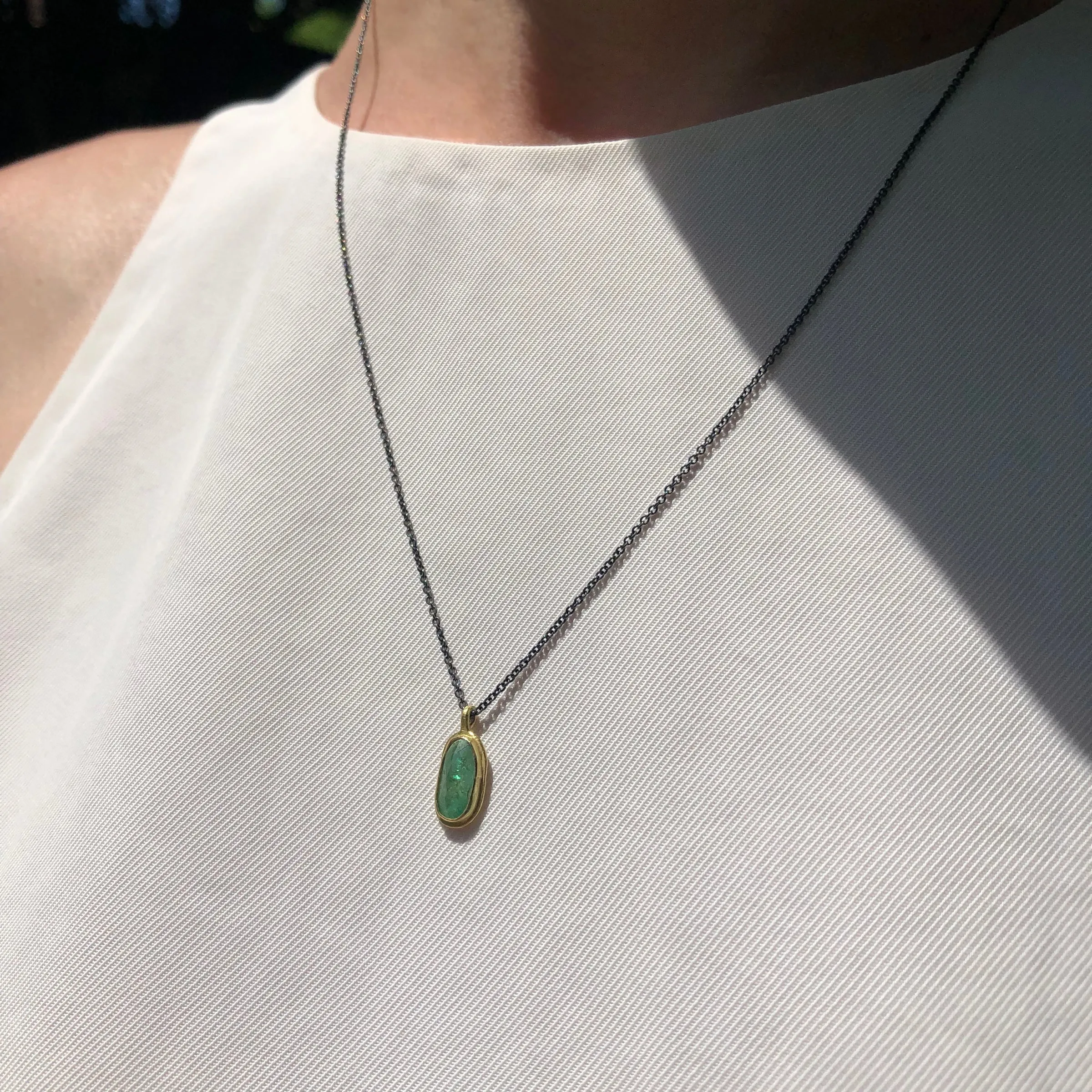 Emerald & 18k pendant